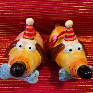 Two painted ceramic dog tree ornaments